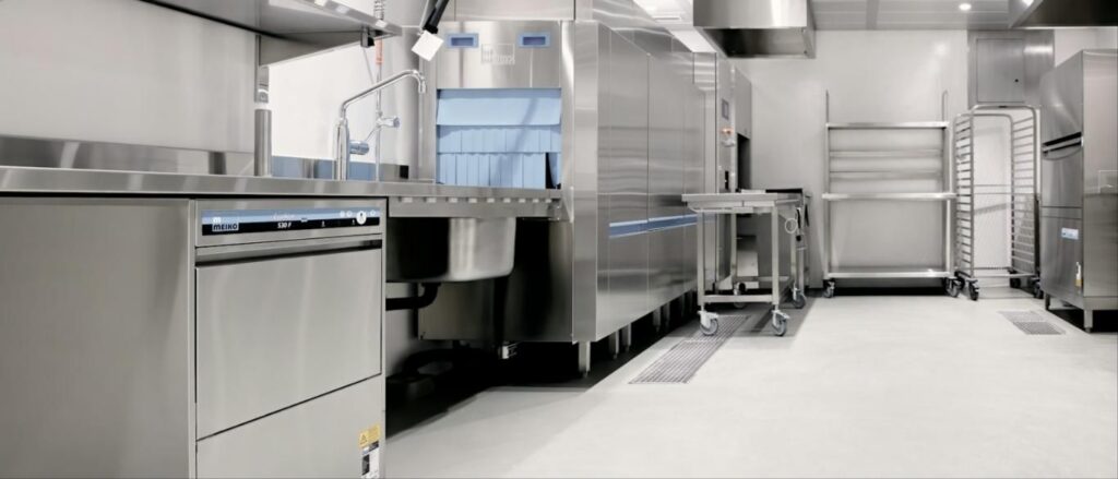 Stainless commercial kitchen with floor drains