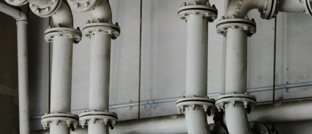 Commercial piping and valves in a mechanical room