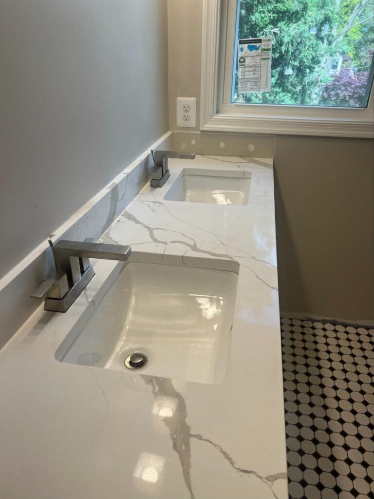 Quartz bathroom vanity with undermount sink and chrome faucet